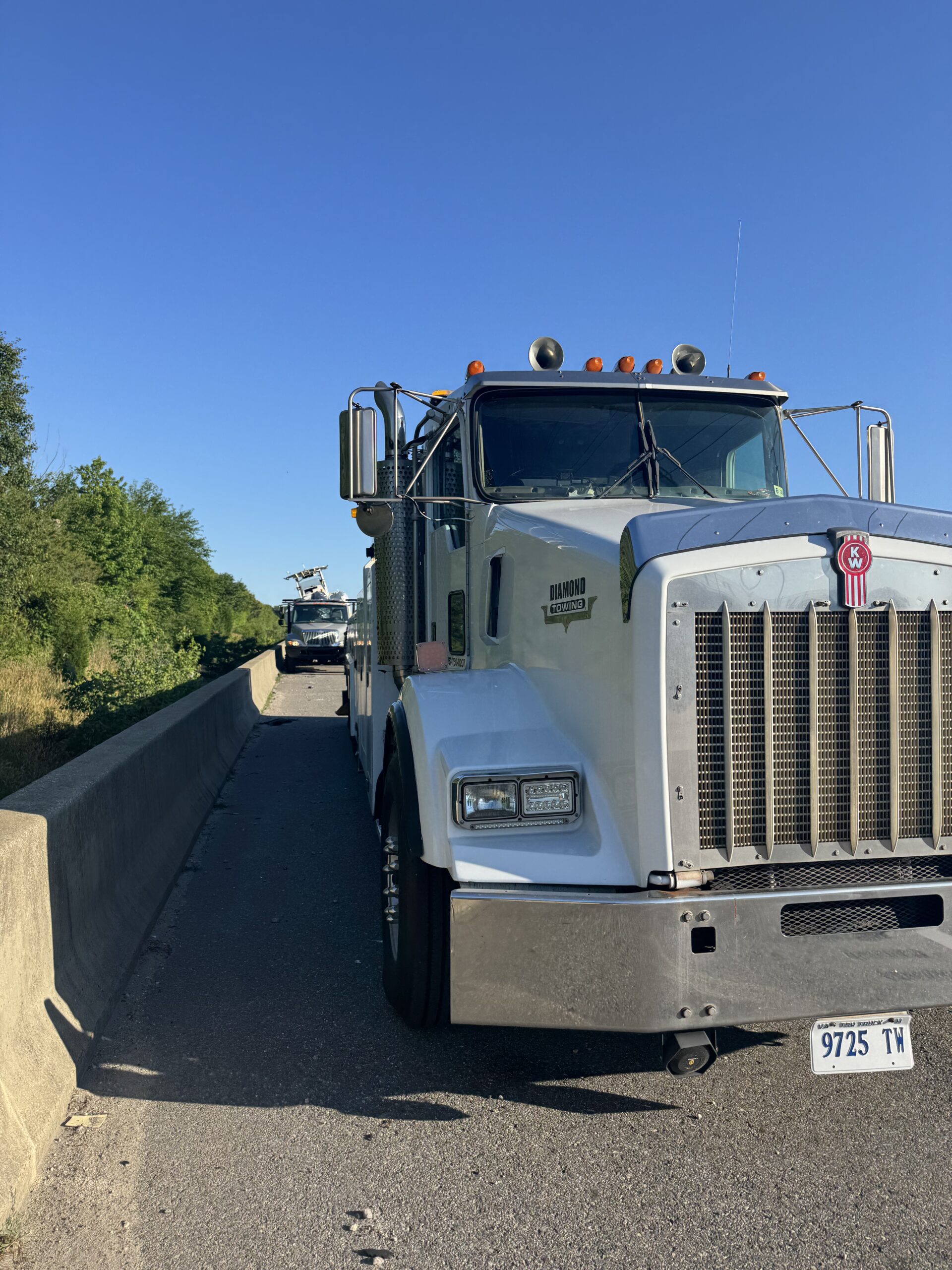 Diamond Towing Kenworth heavy wrecker on I-64 highway corridor