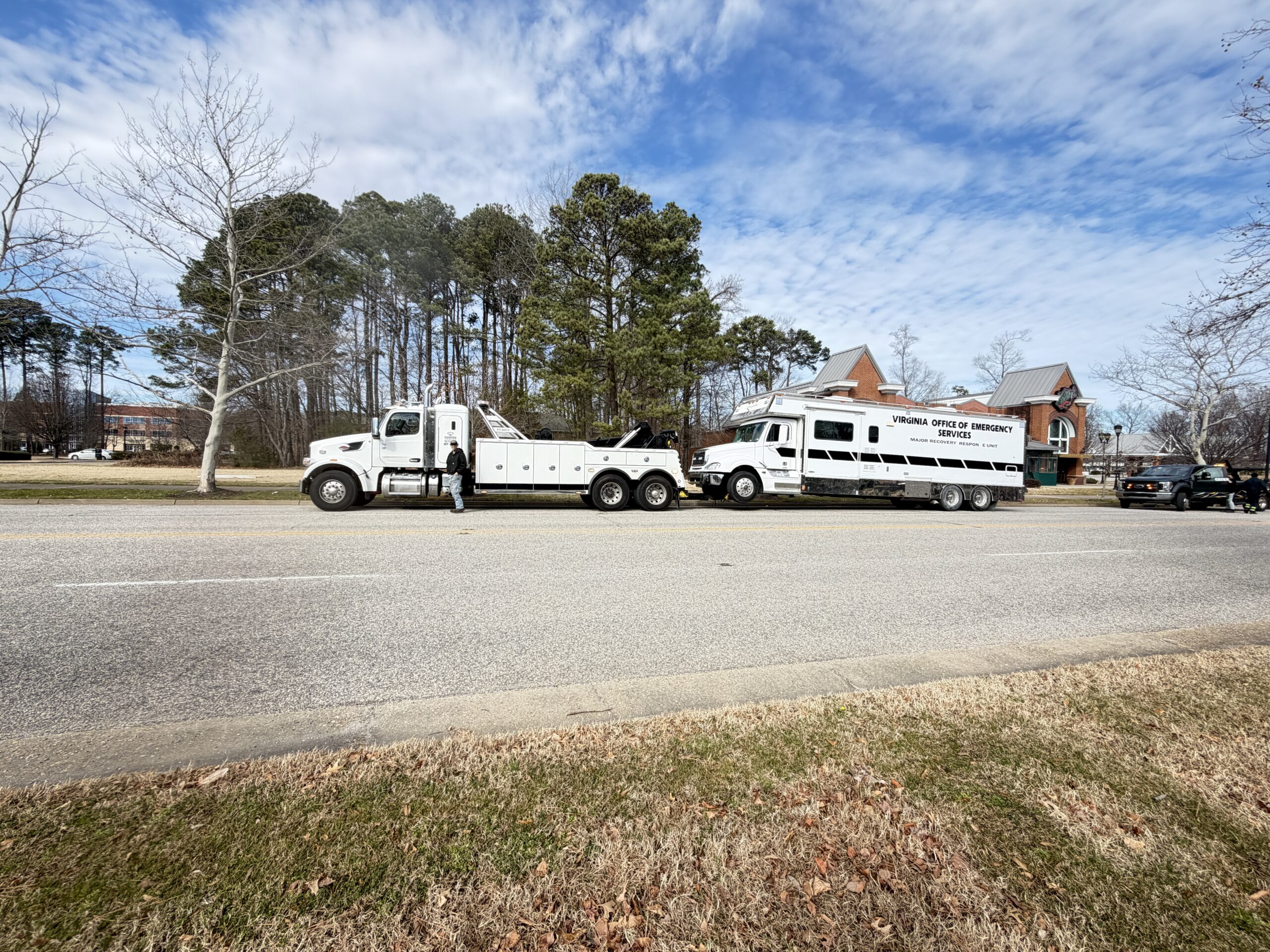 Diamond Towing heavy wrecker recovering a Virginia Office of Emergency Services bus